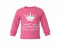 Pink long-sleeve shirt with a white crown graphic and text on a white background