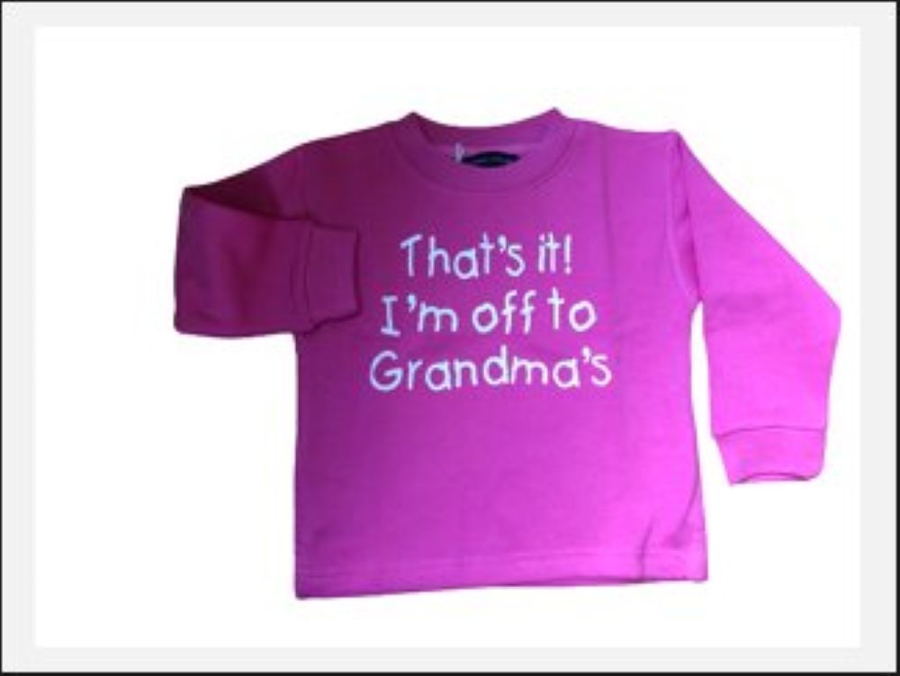 Pink long-sleeve shirt with text 'That's it! I'm off to Grandma's' on a white background