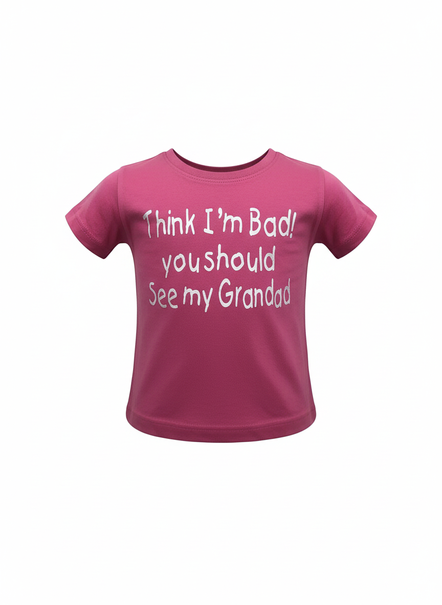 Pink t-shirt with white text on a white background